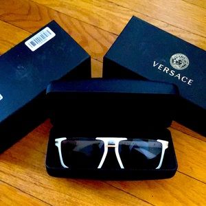 Versace’s Atlantic sunglasses white black gold